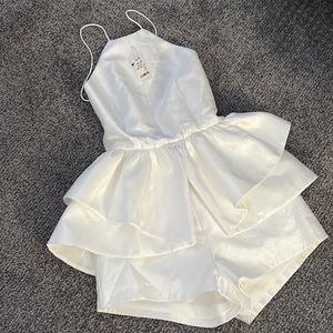 Ivory peplum romper!